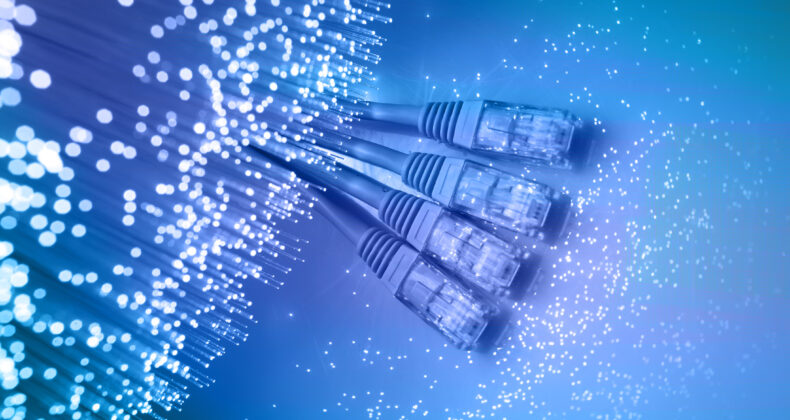 Fond de fibre optique avec beaucoup de points lumineux